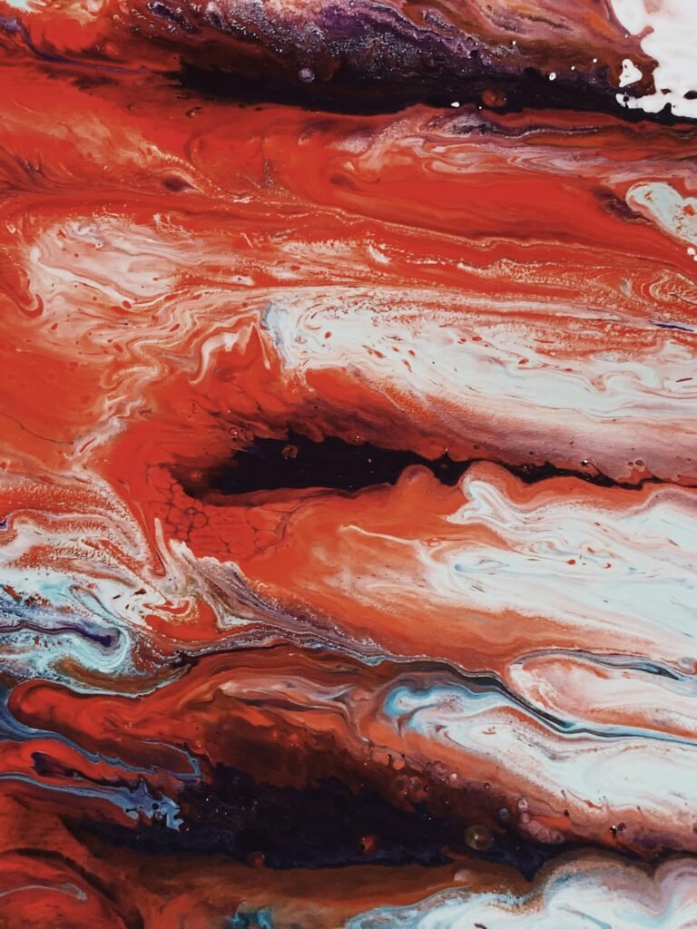 pexels-photo-3530068-3530068 Dynamic red and white abstract fluid painting with expressive textures.